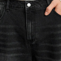 Waist detail of Eizaro baggy black denim jeans showing quality construction