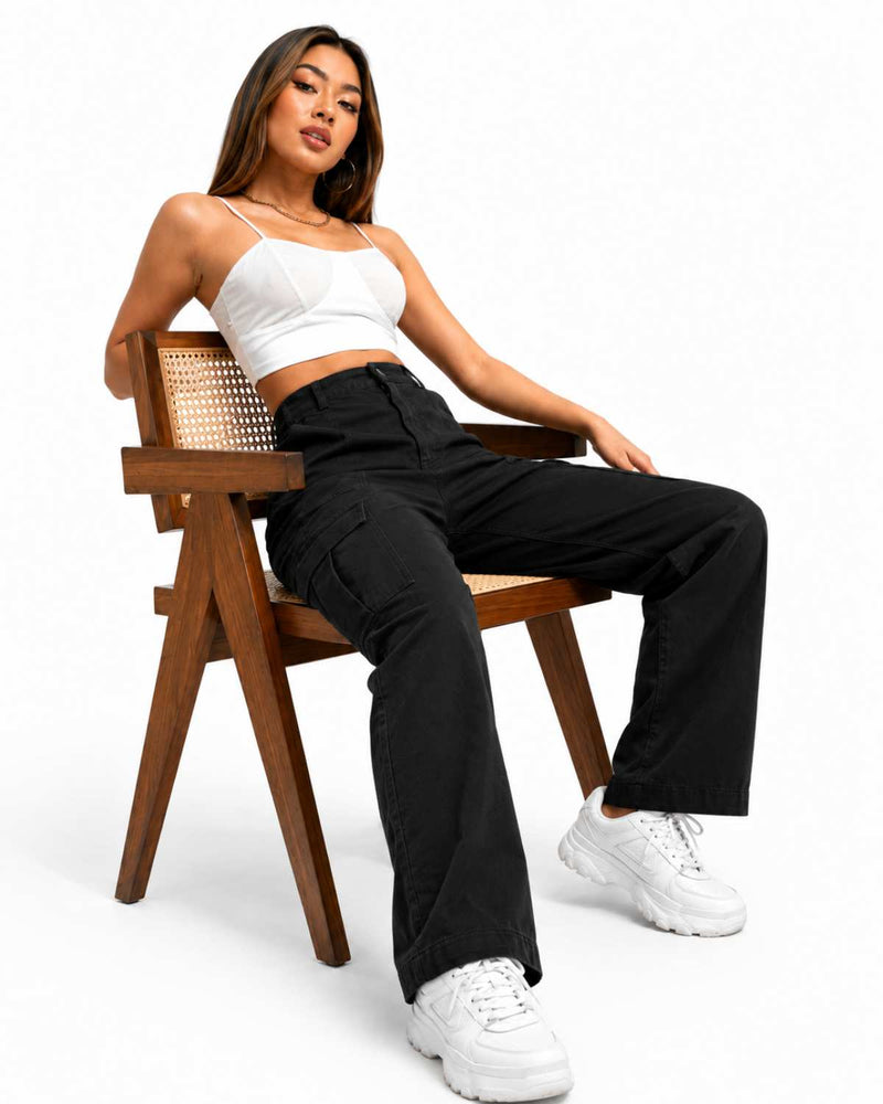 Eizaro Black Cargo Wide Leg Jeans Seated Lifestyle Pose Pure Denim Women India
