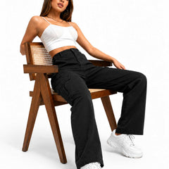 Eizaro Black Cargo Wide Leg Jeans Seated Lifestyle Pose Pure Denim Women India