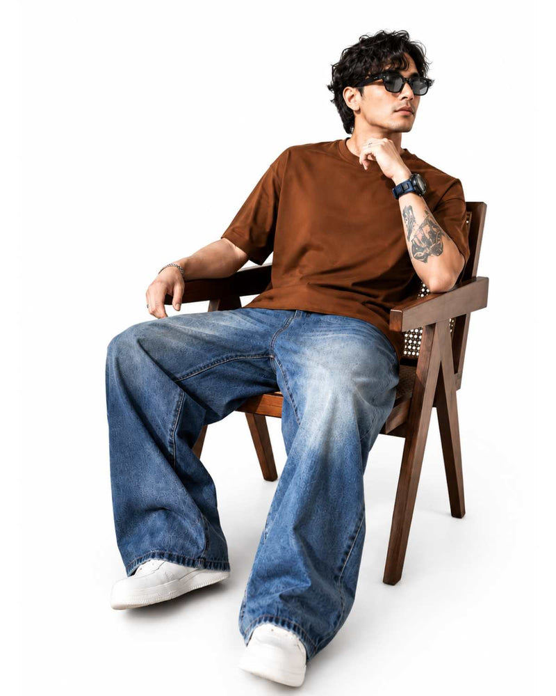 Eizaro Mid Blue Shaded Baggy Fit Jeans Men Seated Lifestyle Casual Street Style India