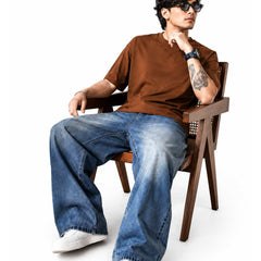 Eizaro Mid Blue Shaded Baggy Fit Jeans Men Seated Lifestyle Casual Street Style India
